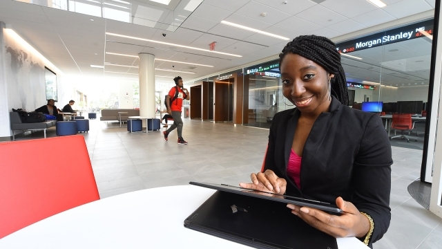 Graduate Student using tablet 
